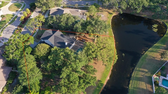 aerial view of property's location featuring property parcel outlined and a nearby body of water