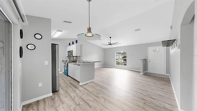 2675 Cherokee St, North Port, FL 34286 - kitchen with stainless steel appliances, a ceiling fan, light wood-style floors, white cabinetry, and baseboards