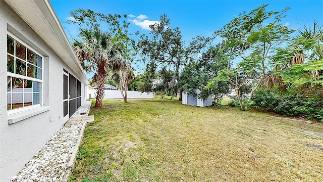 2675 Cherokee St, North Port, FL 34286 - view of yard featuring a storage shed and an outbuilding