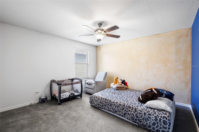 bedroom featuring baseboards, ceiling fan, and carpet floors