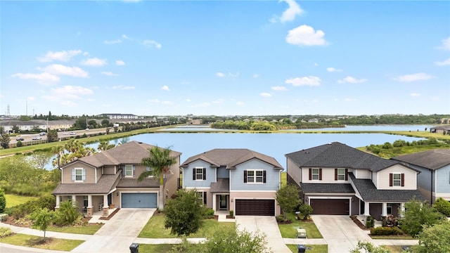 exterior space featuring a water view and a residential view
