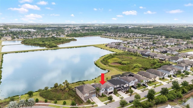 aerial view featuring a water view and a residential view