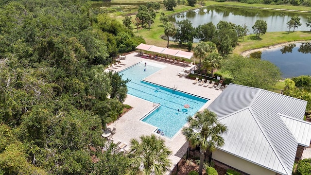 birds eye view of property featuring a water view