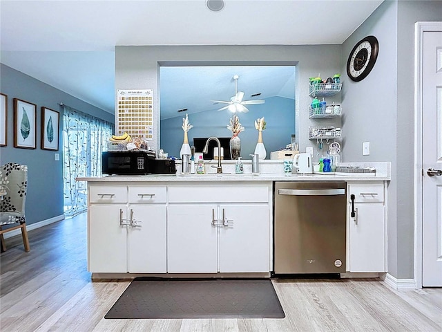 bar featuring black microwave, light wood-style flooring, ceiling fan, and stainless steel dishwasher