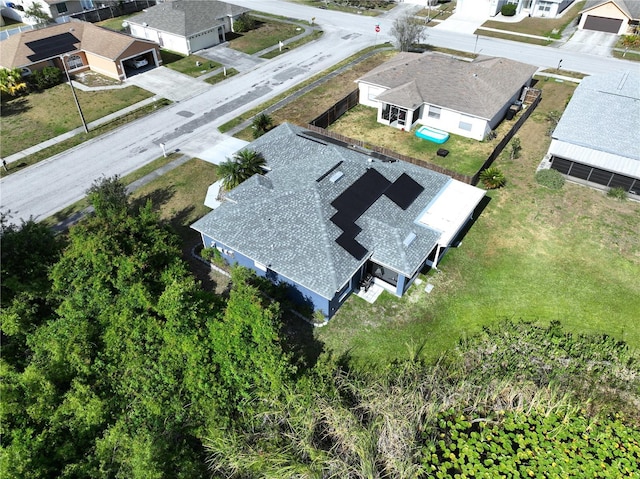 drone / aerial view with a residential view