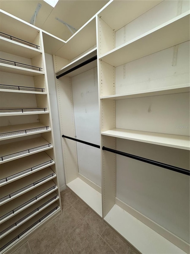 1608 Fox Glen Ct, Winter Springs, FL 32708 - walk in closet featuring tile patterned floors