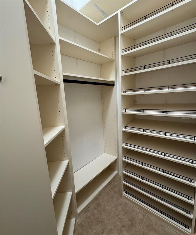 1608 Fox Glen Ct, Winter Springs, FL 32708 - spacious closet featuring tile patterned floors