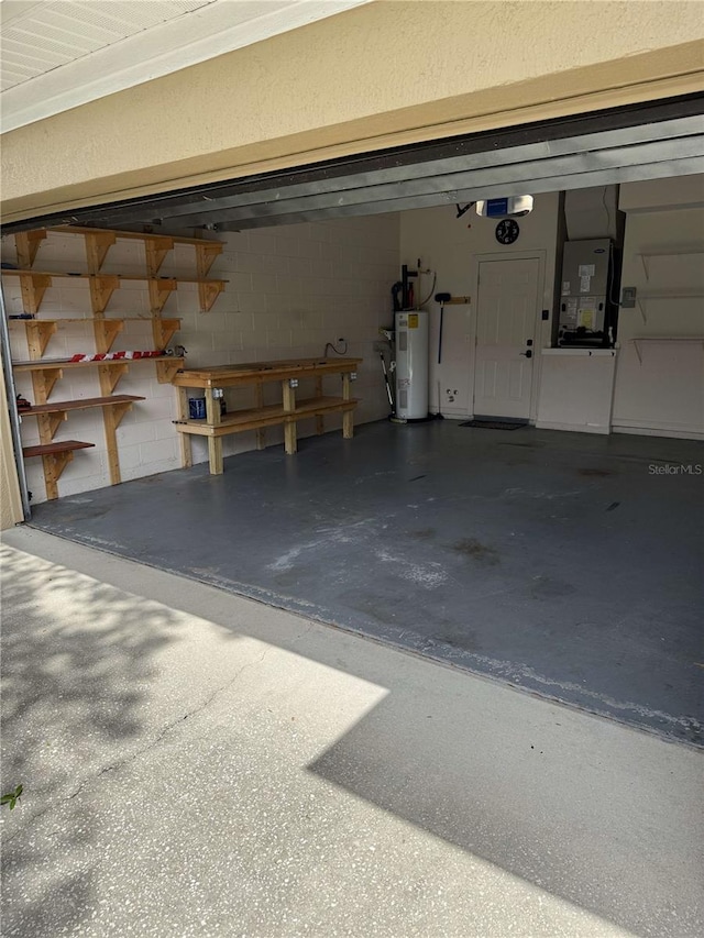 1608 Fox Glen Ct, Winter Springs, FL 32708 - garage with electric water heater, concrete block wall, and heating unit