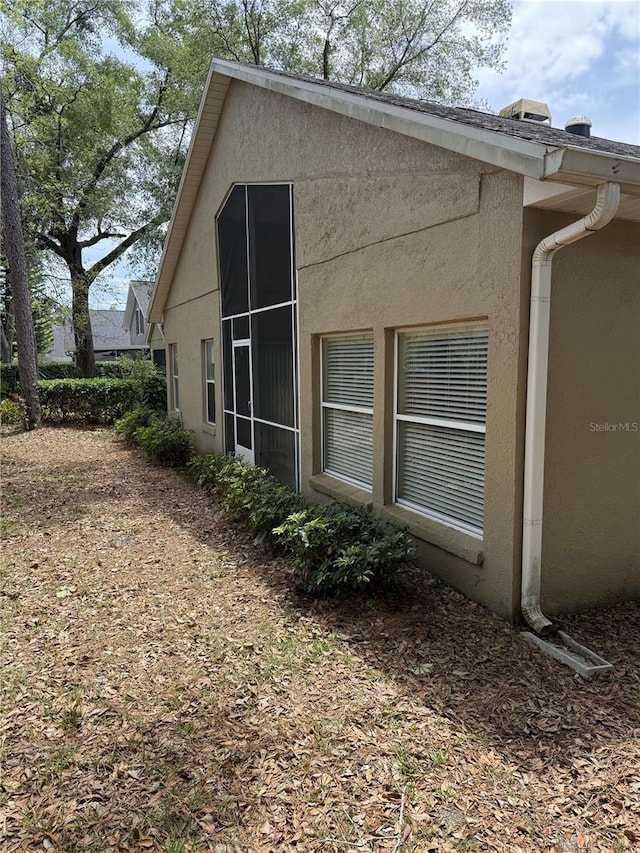 1608 Fox Glen Ct, Winter Springs, FL 32708 - view of side of home featuring stucco siding