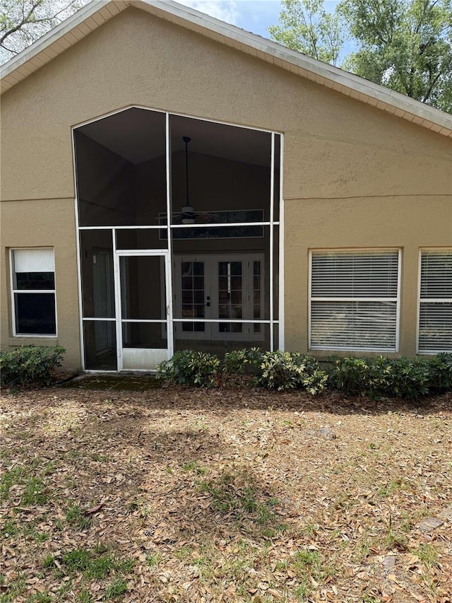 1608 Fox Glen Ct, Winter Springs, FL 32708 - rear view of property featuring stucco siding and french doors