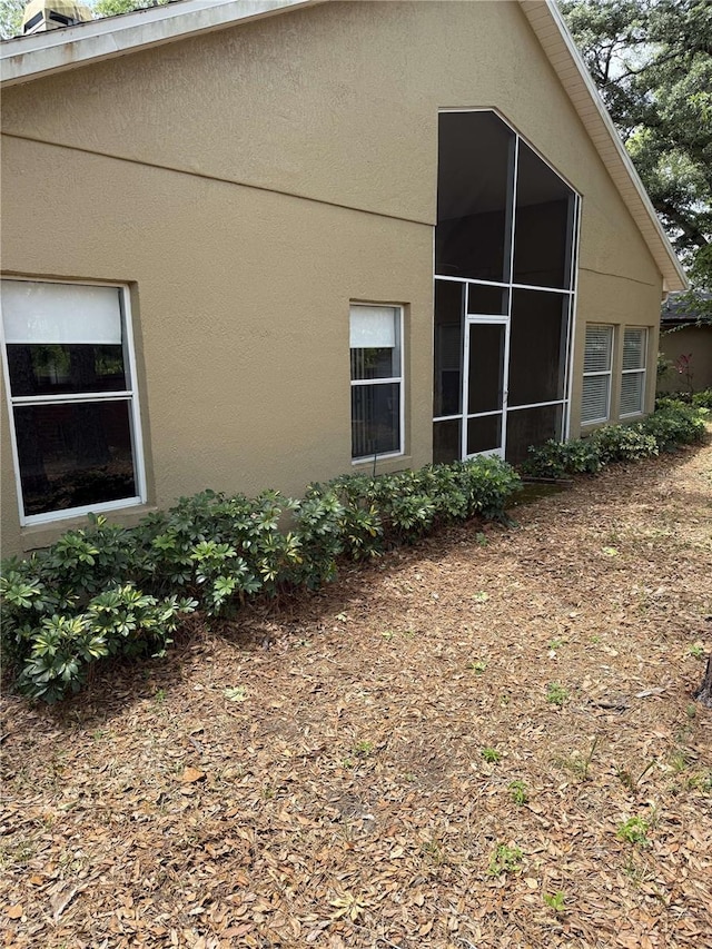 1608 Fox Glen Ct, Winter Springs, FL 32708 - view of side of home with stucco siding
