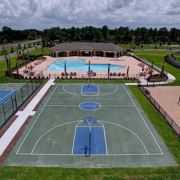 18657 Obregan Dr, Spring Hill, FL 34610 - view of sport court featuring a community pool and community basketball court