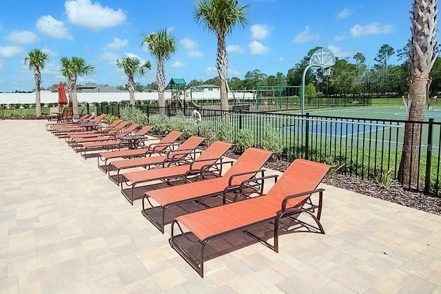 18657 Obregan Dr, Spring Hill, FL 34610 - view of patio / terrace with community basketball court