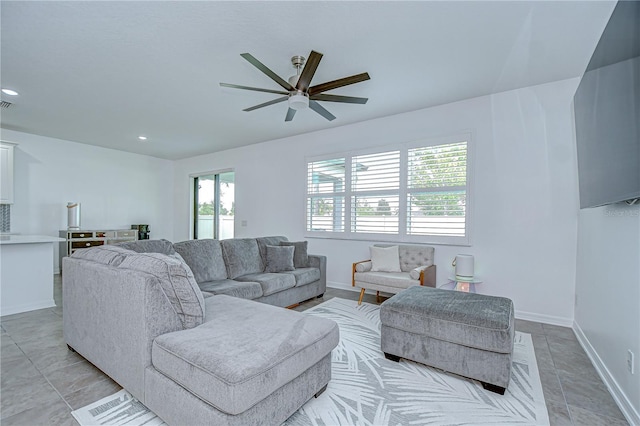 18657 Obregan Dr, Spring Hill, FL 34610 - living room with a ceiling fan, baseboards, and recessed lighting