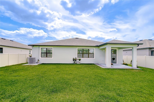 18657 Obregan Dr, Spring Hill, FL 34610 - rear view of property featuring central AC, a patio area, stucco siding, and a shingled roof