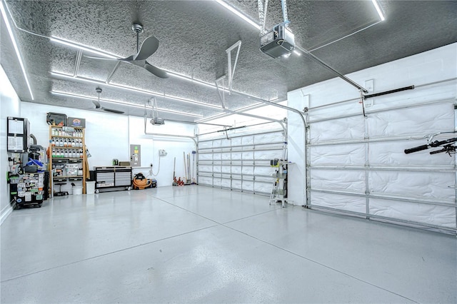 18657 Obregan Dr, Spring Hill, FL 34610 - garage featuring a garage door opener and electric panel