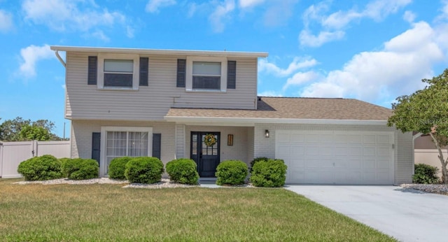 view of front of house featuring brick siding, fence, a garage, concrete driveway, and a front yard
