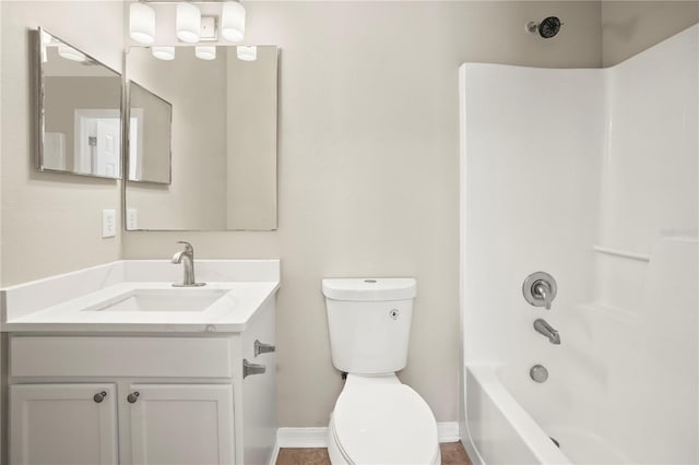 11323 Ivy Flower Loop, Riverview, FL 33578 - bathroom with toilet, shower / bathtub combination, vanity, and baseboards