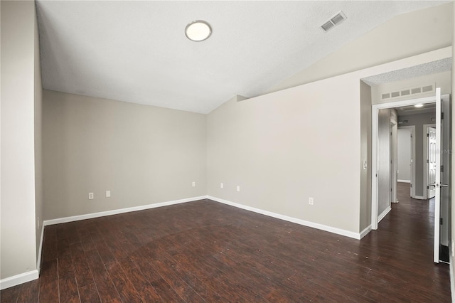 11323 Ivy Flower Loop, Riverview, FL 33578 - unfurnished room featuring lofted ceiling, baseboards, dark wood-style floors, and visible vents