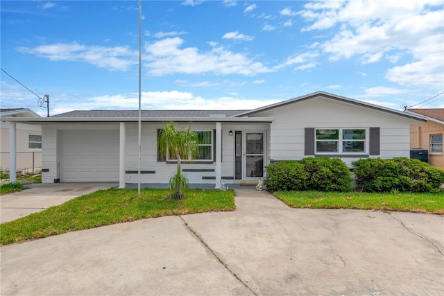 13612 Veronica Dr, Hudson, FL 34667 - ranch-style house featuring an attached garage and driveway