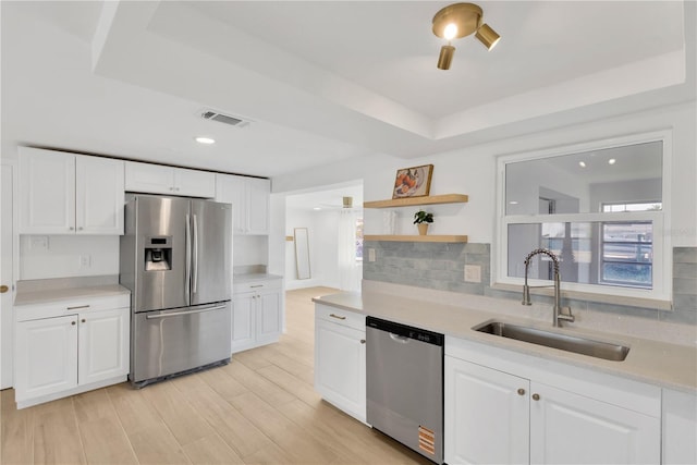 13612 Veronica Dr, Hudson, FL 34667 - kitchen featuring appliances with stainless steel finishes, a sink, light countertops, and recessed lighting