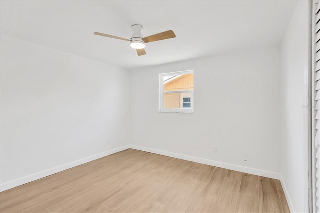13612 Veronica Dr, Hudson, FL 34667 - unfurnished room featuring light wood-style flooring, a ceiling fan, and baseboards