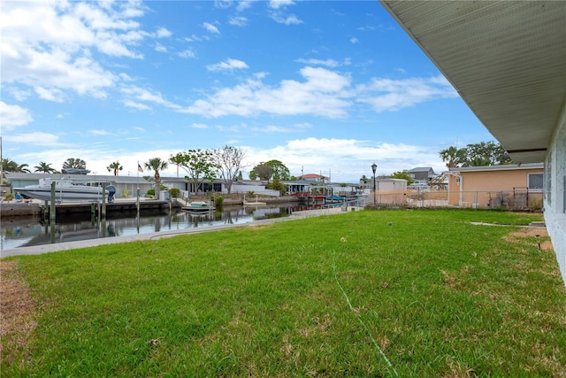 13612 Veronica Dr, Hudson, FL 34667 - view of yard featuring a water view, boat lift, and a dock