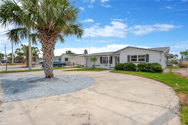 13612 Veronica Dr, Hudson, FL 34667 - ranch-style home with curved driveway