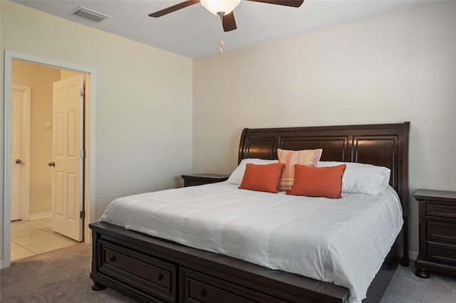 carpeted bedroom featuring a ceiling fan