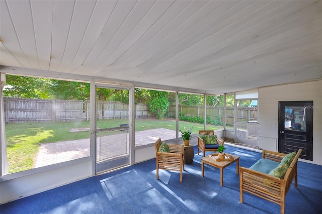 sunroom / solarium featuring plenty of natural light