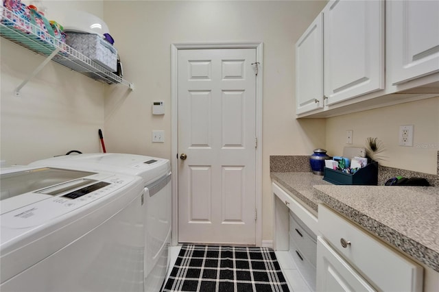 laundry area with cabinet space and washing machine and dryer