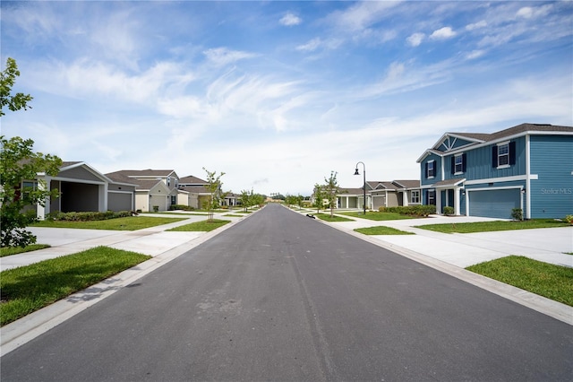 2115 Forage Dr, Kissimmee, FL 34746 - view of road featuring street lights, sidewalks, and a residential view