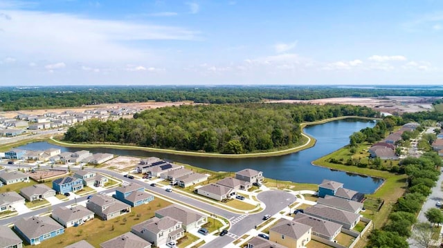 2115 Forage Dr, Kissimmee, FL 34746 - drone / aerial view with a water view, a wooded view, and a residential view