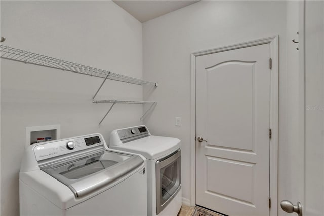laundry area featuring laundry area and independent washer and dryer