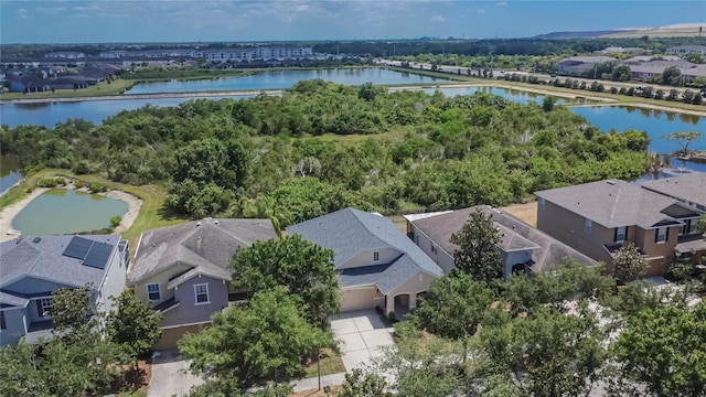 aerial view with a water view and a residential view