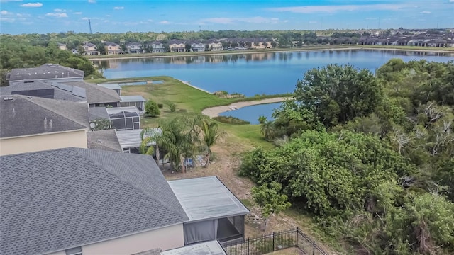 bird's eye view with a water view and a residential view