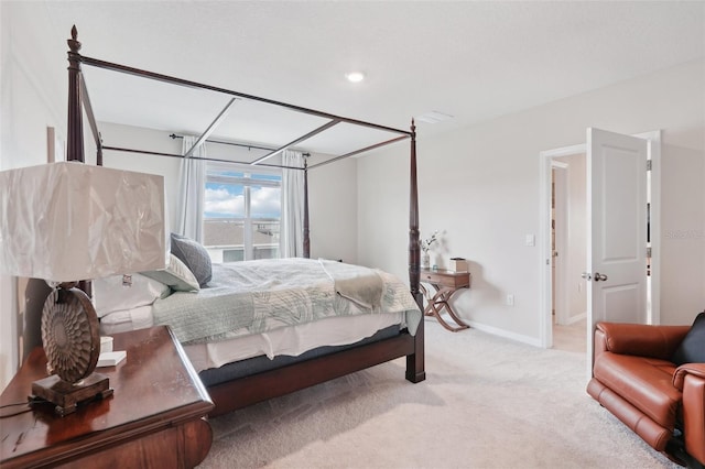 carpeted bedroom with baseboards