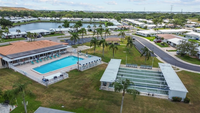 9743 36th Way N Unit 4, Pinellas Park, FL 33782 - aerial view of residential area featuring a pool area and a nearby body of water