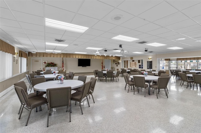 9743 36th Way N Unit 4, Pinellas Park, FL 33782 - dining space with a paneled ceiling and dark speckled floor