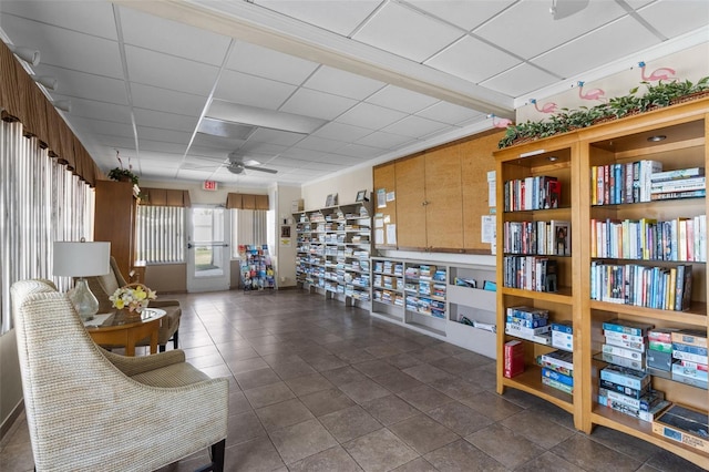 9743 36th Way N Unit 4, Pinellas Park, FL 33782 - living area featuring a ceiling fan and a drop ceiling