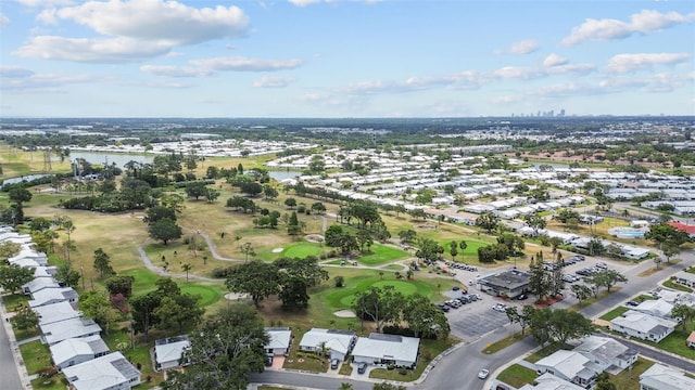 9743 36th Way N Unit 4, Pinellas Park, FL 33782 - aerial view of property and surrounding area with a large body of water, a local golf course, and nearby suburban area