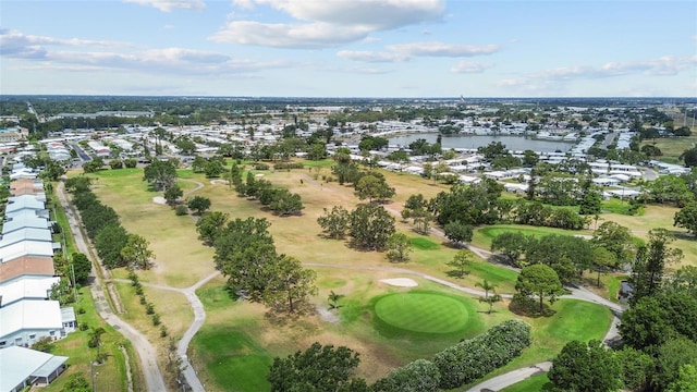 9743 36th Way N Unit 4, Pinellas Park, FL 33782 - aerial overview of property's location featuring a large body of water, nearby suburban area, and a golf course