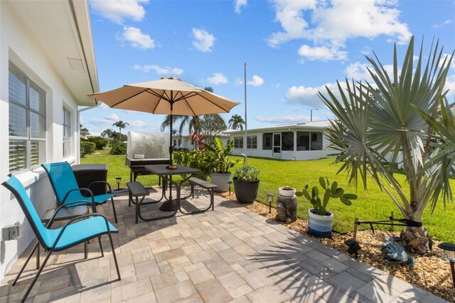 9743 36th Way N Unit 4, Pinellas Park, FL 33782 - view of patio with outdoor dining space