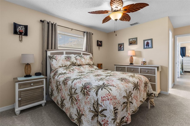 9743 36th Way N Unit 4, Pinellas Park, FL 33782 - bedroom with carpet, baseboards, a textured ceiling, and a ceiling fan