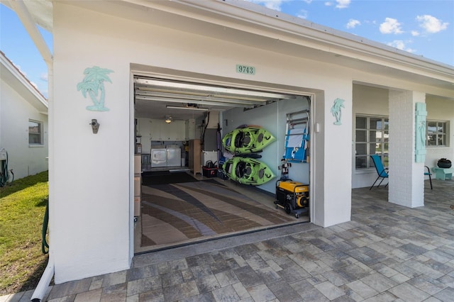 9743 36th Way N Unit 4, Pinellas Park, FL 33782 - garage featuring washer / dryer