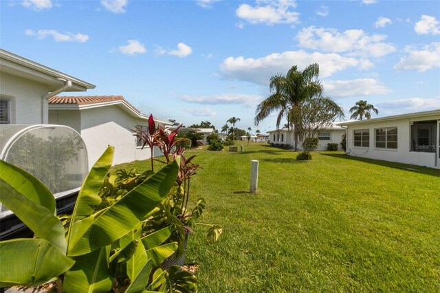9743 36th Way N Unit 4, Pinellas Park, FL 33782 - view of green lawn