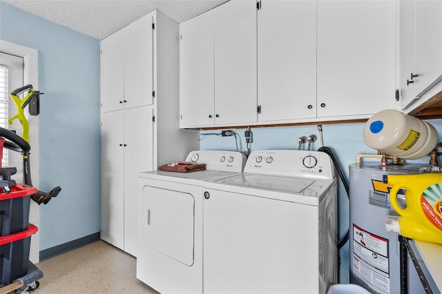 9743 36th Way N Unit 4, Pinellas Park, FL 33782 - washroom featuring water heater, cabinet space, independent washer and dryer, and a textured ceiling