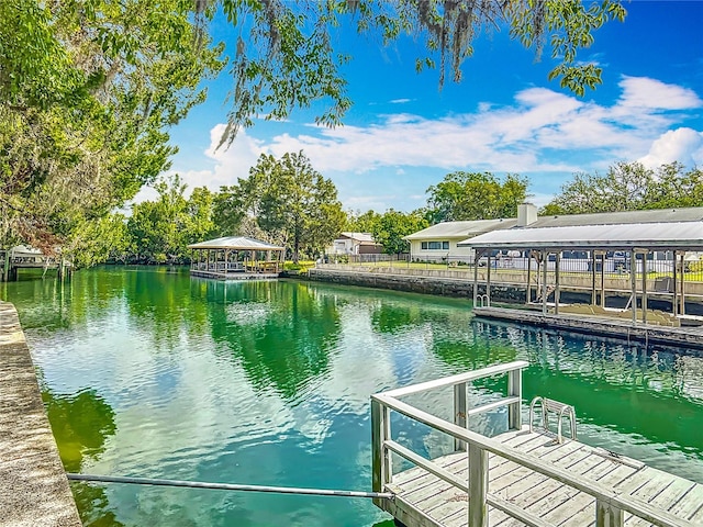 1011 SE 4th Ave, Crystal River, FL 34429 - view of dock with a gazebo and a water view