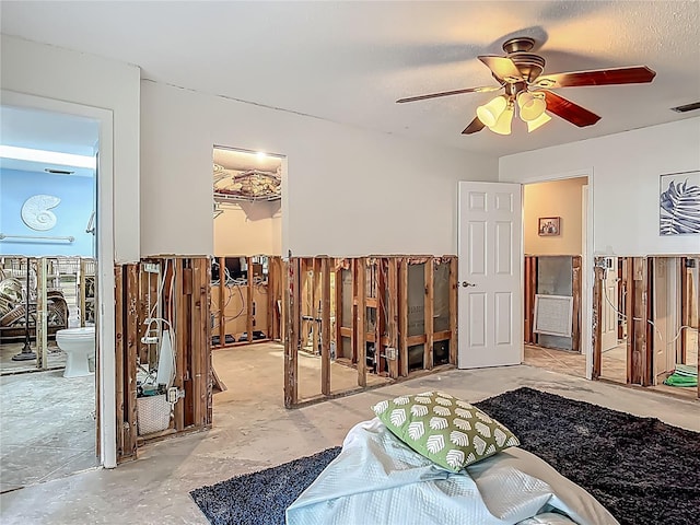 1011 SE 4th Ave, Crystal River, FL 34429 - bedroom with connected bathroom, a closet, a walk in closet, visible vents, and ceiling fan