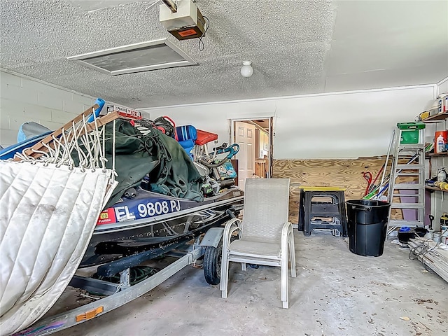 1011 SE 4th Ave, Crystal River, FL 34429 - garage featuring concrete block wall and a garage door opener